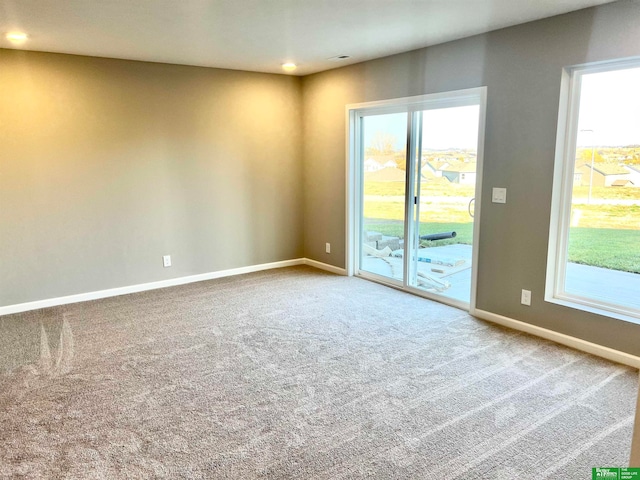 view of carpeted spare room