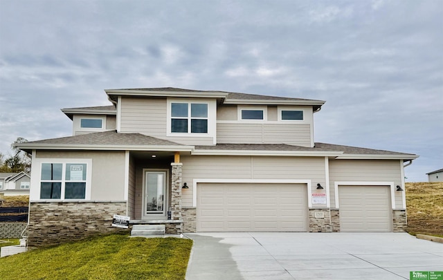 17459 Samuel St, Bennington, NE 68007 - prairie-style home featuring stone siding, concrete driveway, a shingled roof, a garage, and a front lawn