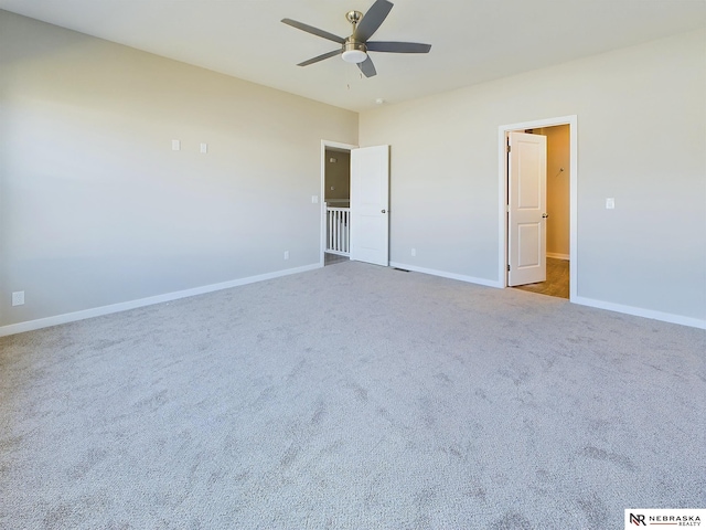 unfurnished bedroom featuring carpet and ceiling fan