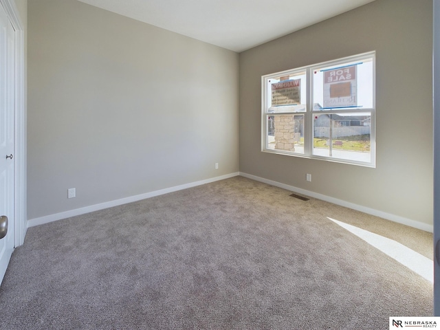 empty room featuring carpet