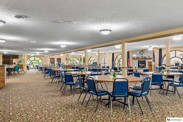 dining room with a textured ceiling