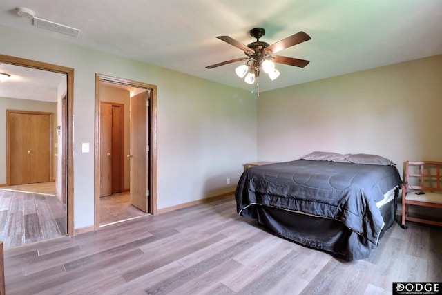 bedroom featuring ceiling fan and light wood-type flooring