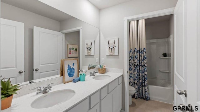 full bathroom featuring vanity, shower / bath combination with curtain, and toilet