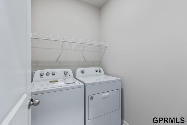 laundry area featuring washer and clothes dryer