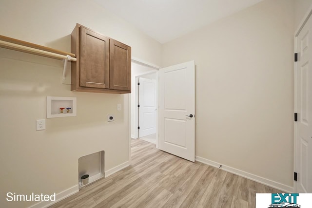 laundry room featuring washer hookup, light hardwood / wood-style flooring, cabinets, and hookup for an electric dryer