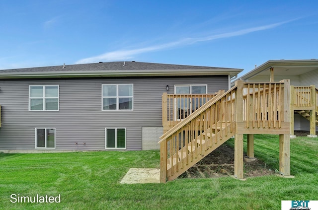 back of property featuring a lawn and a deck