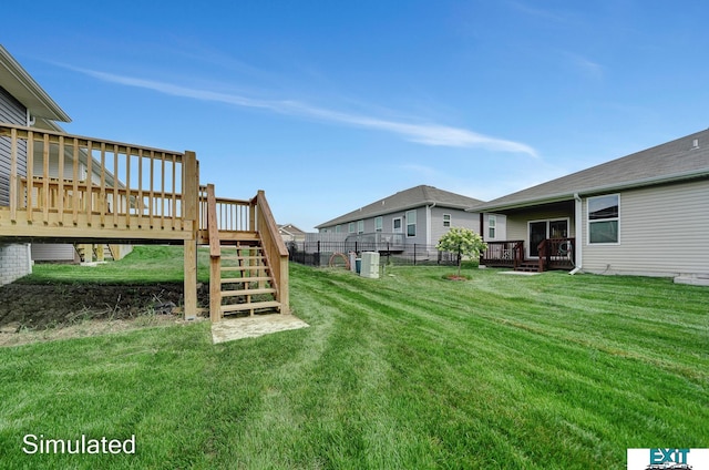 view of yard with a deck