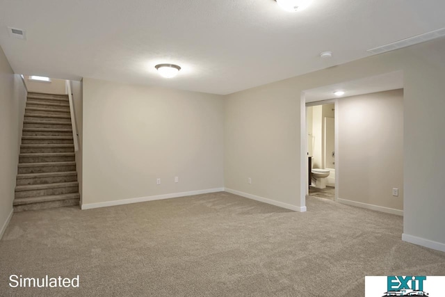 basement with light colored carpet