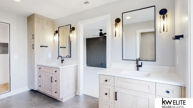 bathroom featuring ceiling fan, tile patterned floors, and double sink vanity