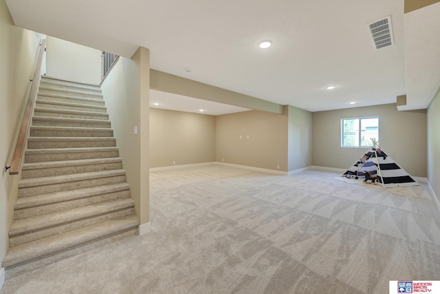 interior space with light colored carpet