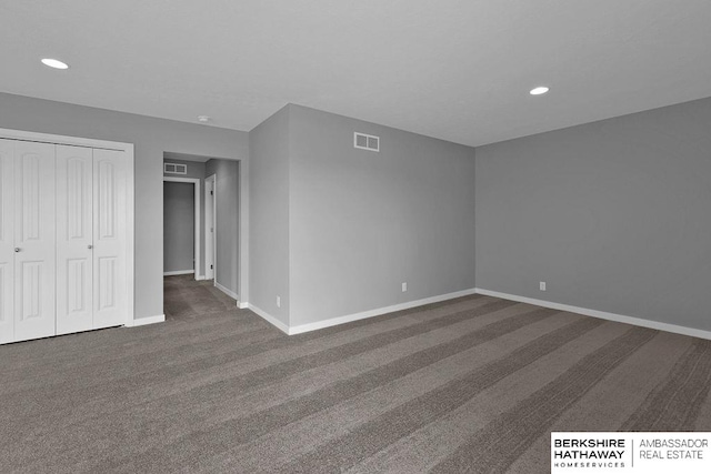 unfurnished room with carpet flooring