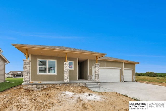 prairie-style home with a garage