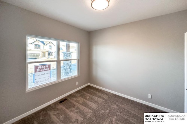 view of carpeted spare room