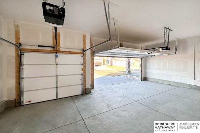 garage featuring a garage door opener