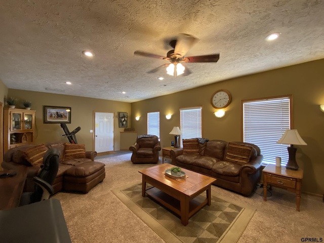 living room with recessed lighting, a ceiling fan, and carpet floors