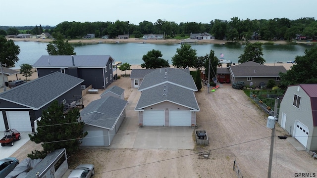 aerial view featuring a residential view and a water view