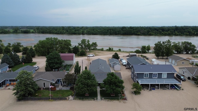 aerial view featuring a residential view and a water view