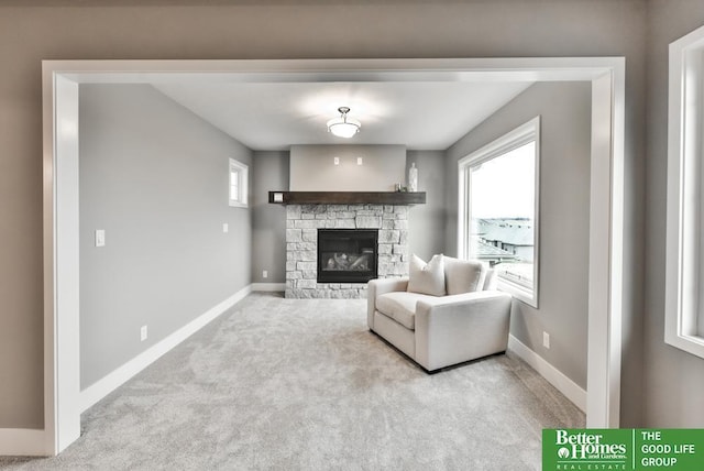 19058 Camelback Cir, Gretna, NE 68136 - living room featuring a fireplace and light colored carpet