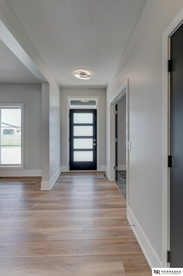 interior space with light hardwood / wood-style flooring