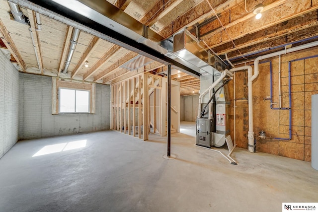 basement featuring heating unit