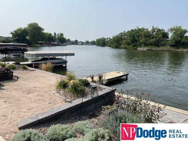 dock area featuring a water view