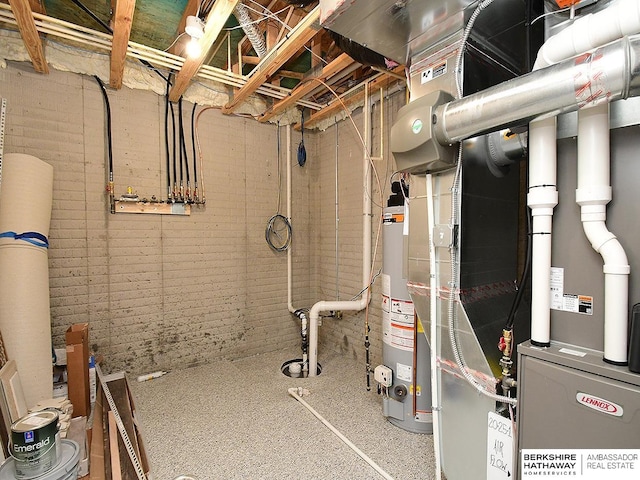 utility room with gas water heater