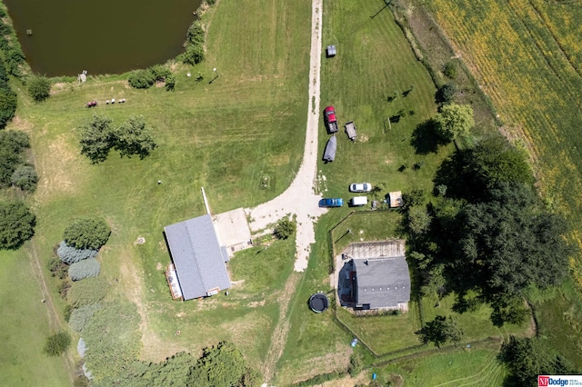 birds eye view of property with a rural view