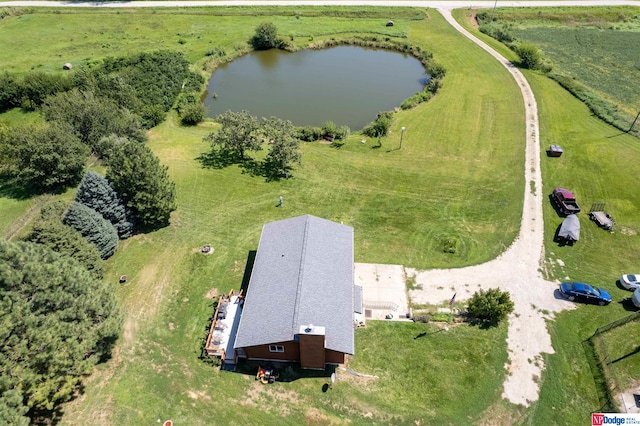 bird's eye view with a water view and a rural view