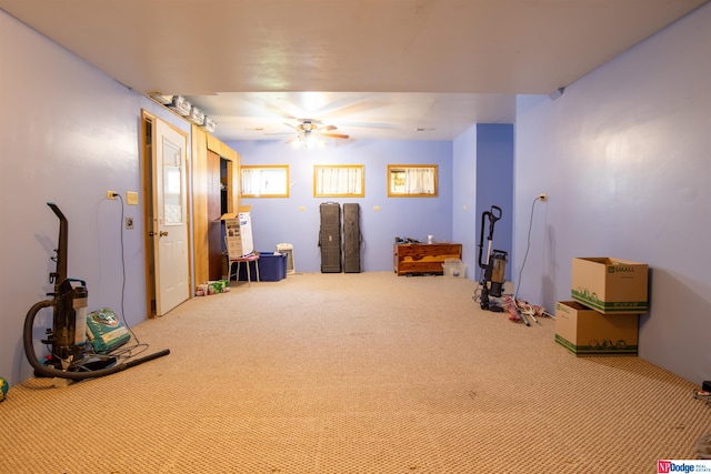 miscellaneous room with carpet and ceiling fan