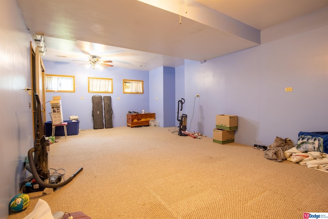 miscellaneous room featuring carpet floors and ceiling fan