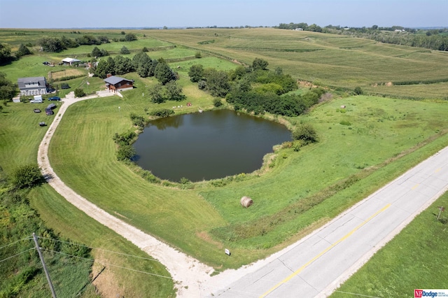 bird's eye view featuring a water view and a rural view