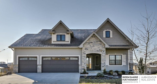 craftsman inspired home featuring a garage