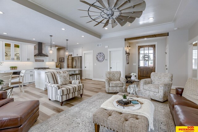 entrance foyer with hardwood / wood-style flooring and a textured ceiling