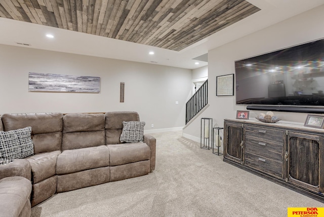 living room with light colored carpet and wood ceiling