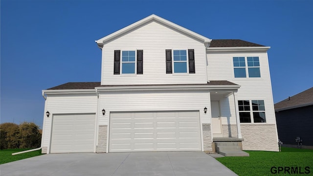 front of property featuring a garage