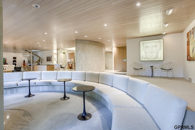 carpeted living room featuring wood ceiling