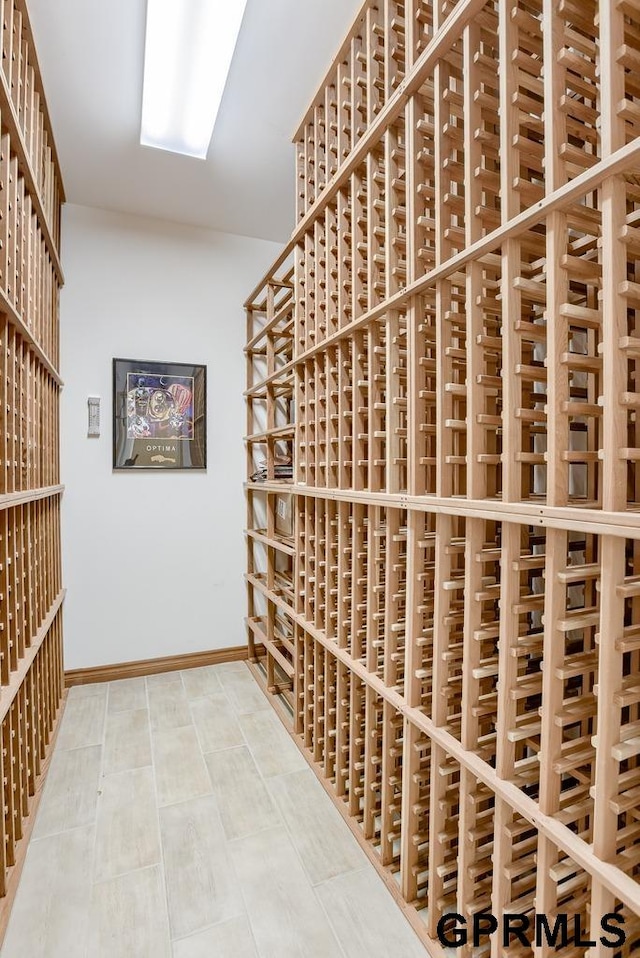 wine room with tile patterned floors