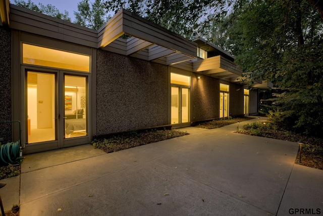 modern home featuring a patio