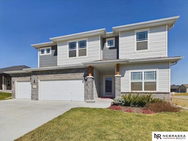view of front of home with a front lawn, stone siding, a garage, and concrete driveway