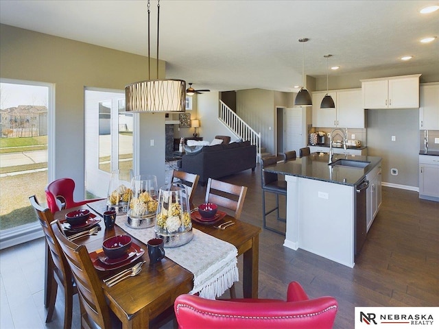 dining room with dark wood-style flooring, a ceiling fan, and recessed lighting