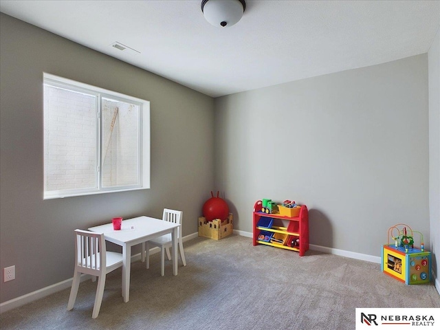 game room with visible vents, baseboards, and carpet floors