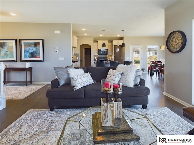 living room featuring dark hardwood / wood-style floors