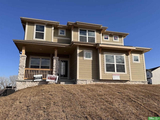 8701 N 177th St, Bennington, NE 68007 - prairie-style house featuring a porch
