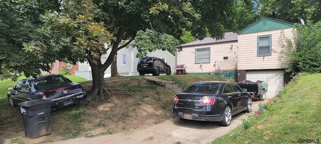 view of front of property with a garage