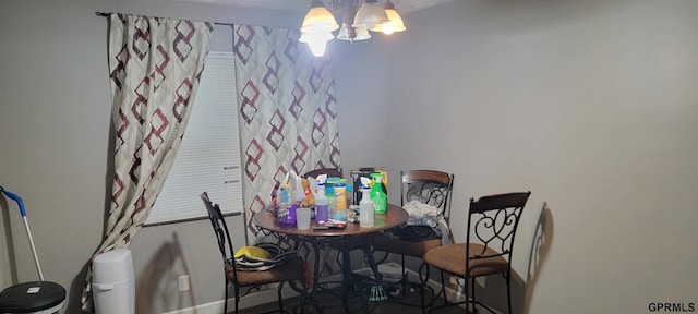 dining room with a notable chandelier