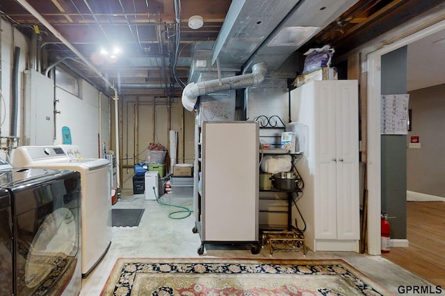 basement featuring separate washer and dryer