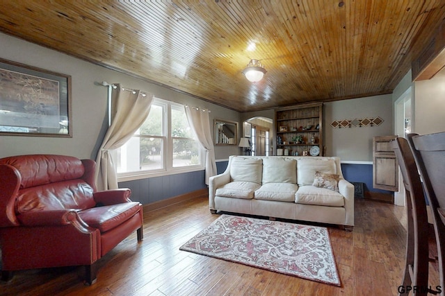 living room with hardwood / wood-style floors and wood ceiling