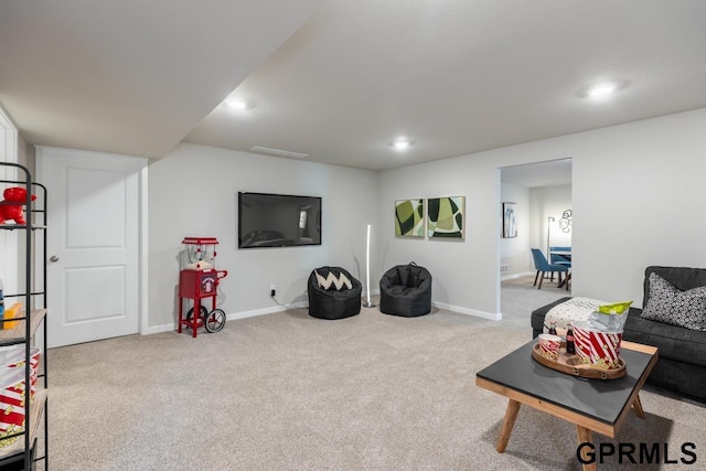 living room featuring light carpet