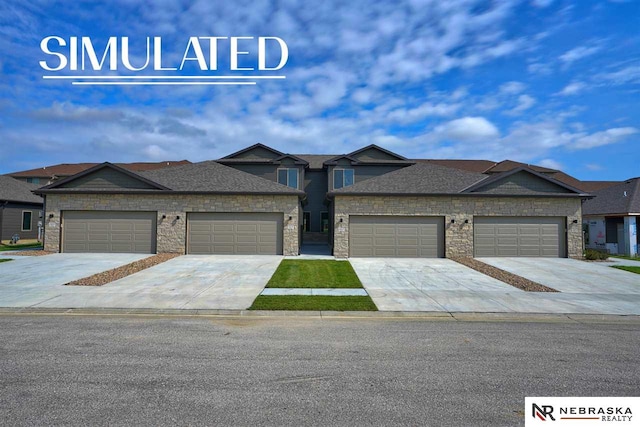 view of front of property with a garage