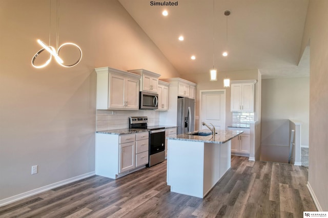 kitchen featuring stainless steel appliances, sink, hanging light fixtures, and white cabinets